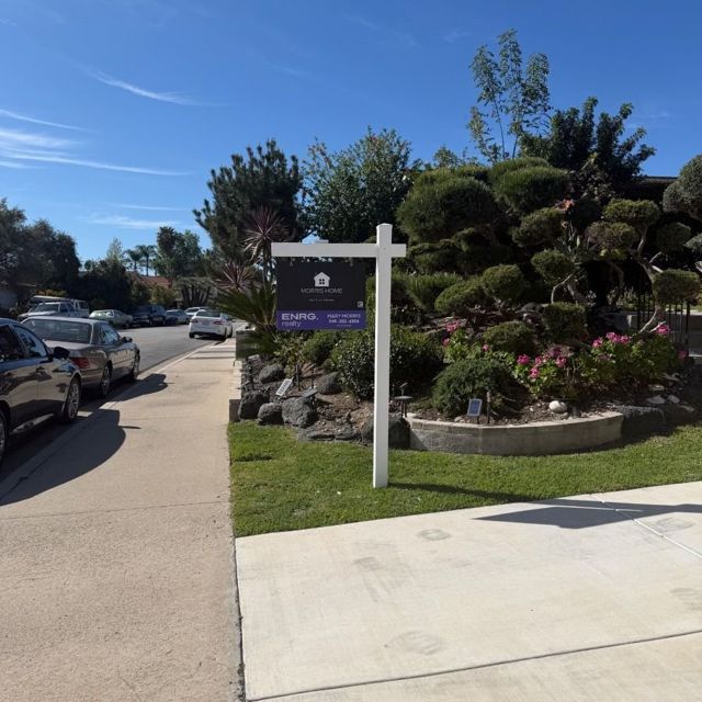 Real estate sign post installed by R.E.S.S. on an Orange County residential street