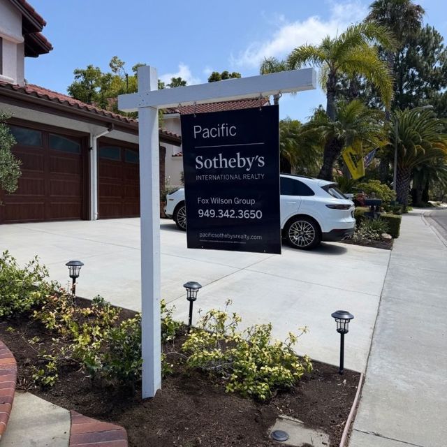 Real estate sign post installed by R.E.S.S. at a luxury coastal Orange County home
