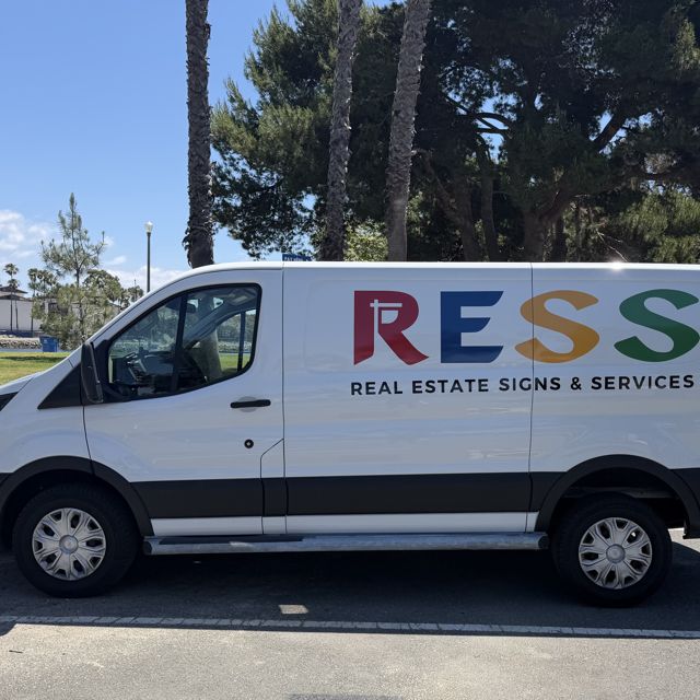 R.E.S.S. - Real Estate Signs & Services branded installation van
